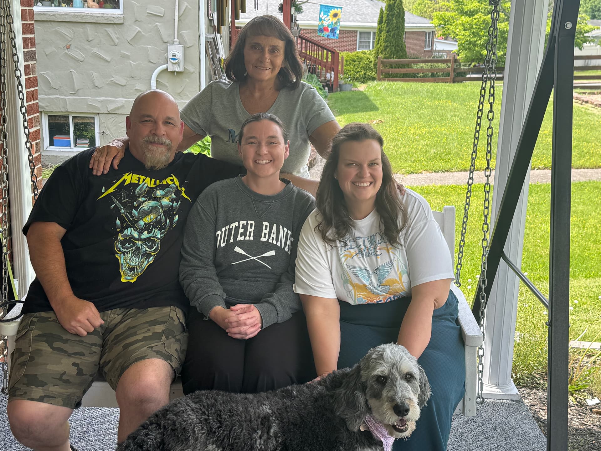Ryanne Ball spending time with family on a porch swing